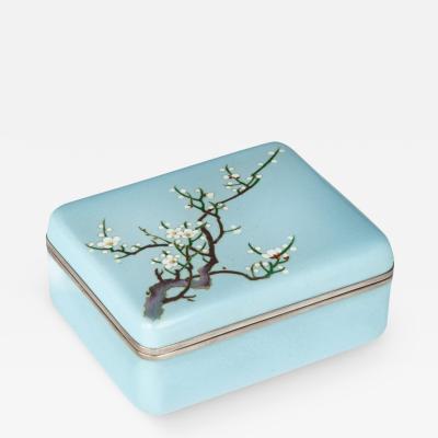 A small Showa period cloisonn box with a single branch of blossom
