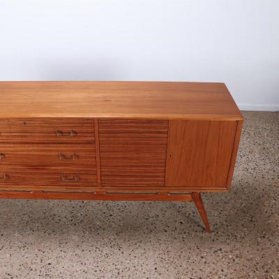 A stunning Mid Century Modern zebra wood sideboard C 1950 