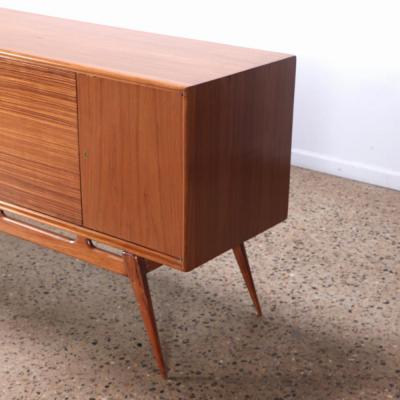 A stunning Mid Century Modern zebra wood sideboard C 1950 
