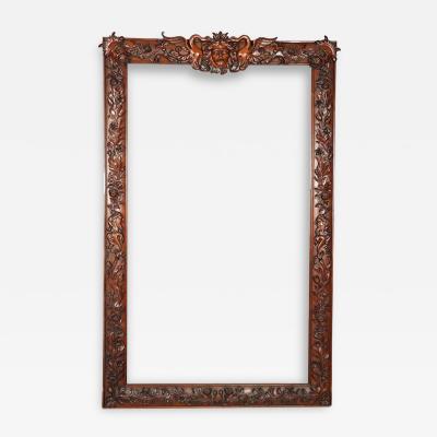 A stunning relief carved mahogany frame C 1890 