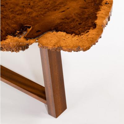 A stylish polished Amboyna Coffee Table