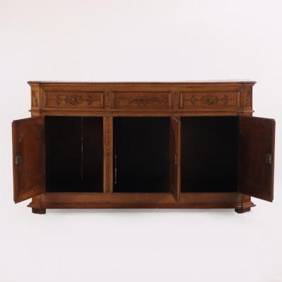 A substantial French or Belgian carved oak sideboard or buffet 18th C 