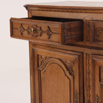 A substantial French or Belgian carved oak sideboard or buffet 18th C 