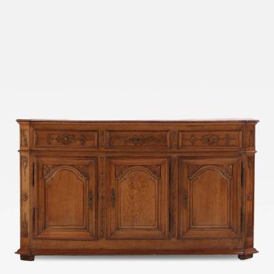 A substantial French or Belgian carved oak sideboard or buffet 18th C 