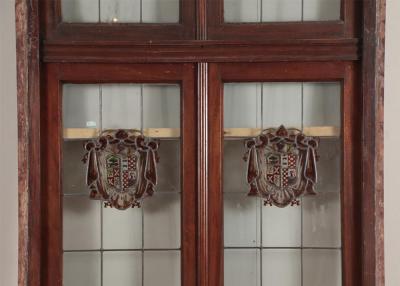 A two panel mahogany window set with leaded glass and frame circa 1920 
