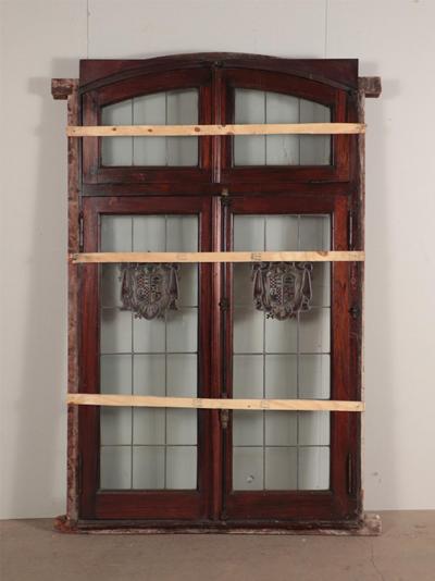 A two panel mahogany window set with leaded glass and frame circa 1920 