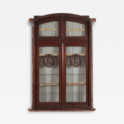 A two panel mahogany window set with leaded glass and frame circa 1920 