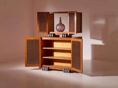 A two part cabinet in rare exotic woods with solid ebony inlays Italy 1990s