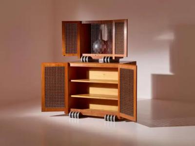 A two part cabinet in rare exotic woods with solid ebony inlays Italy 1990s