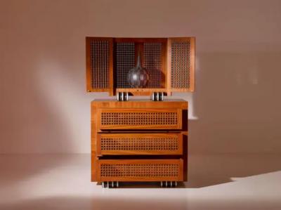 A two part cabinet in rare exotic woods with solid ebony inlays Italy 1990s