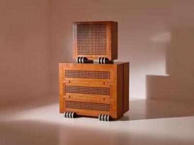 A two part cabinet in rare exotic woods with solid ebony inlays Italy 1990s