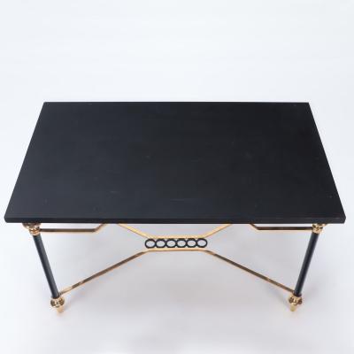 A two tone bronze coffee table with black stone Circa 1945