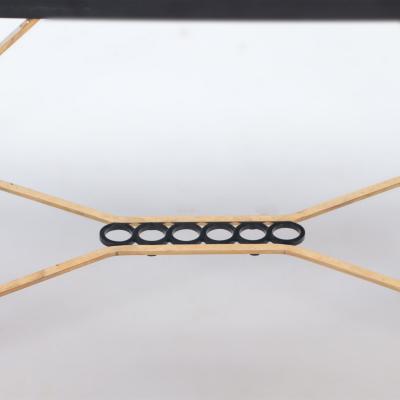 A two tone bronze coffee table with black stone Circa 1945