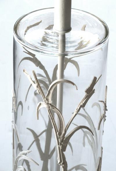 A unique American pair of cylindrical glass lamps with applied bamboo decoration