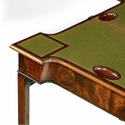 A very fine pair of George III mahogany concertina action card tables