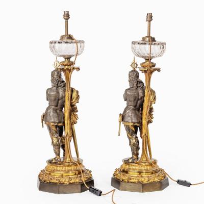 A very fine pair of mid Victorian parcel gilt bronze oil lamps by Hinks