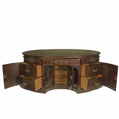A very large mahogany centrepiece partners desk in the Chippendale style
