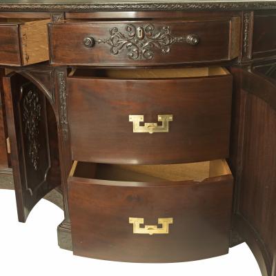 A very large mahogany centrepiece partners desk in the Chippendale style