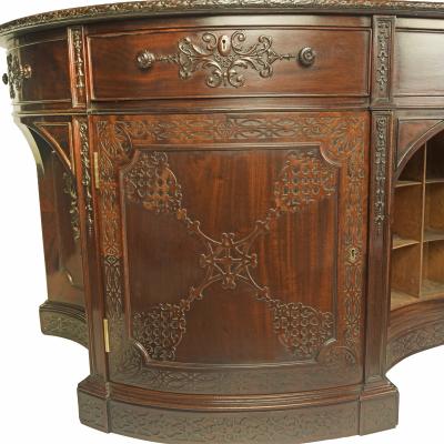A very large mahogany centrepiece partners desk in the Chippendale style