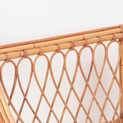 A vintage Italian rattan twin size bed frame circa 1960 