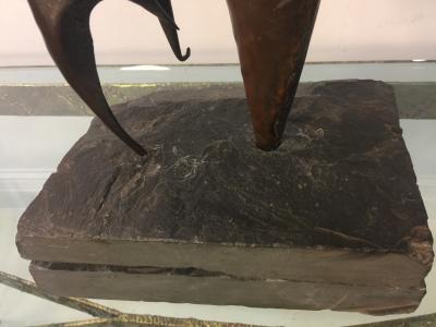 ABSTRACT BRUTALIST SCULPTURE WITH BLACK SLATE BASE