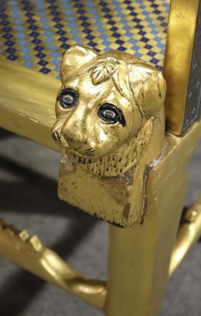 AMAZING EGYPTIAN REVIVAL GOLD ENAMELED BRASS AND GILDED WOOD LION ARM BENCH