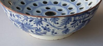AN 18TH CENTURY DELFTWARE COLANDER