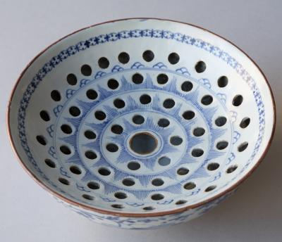 AN 18TH CENTURY DELFTWARE COLANDER