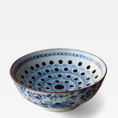 AN 18TH CENTURY DELFTWARE COLANDER