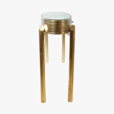 AN ELEGANT GOLD LEAF FINISHED CONSOLE