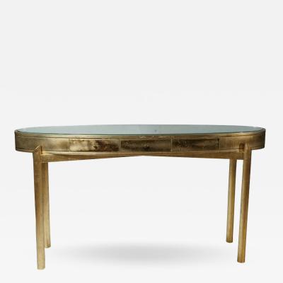 AN ELEGANT GOLD LEAF FINISHED CONSOLE