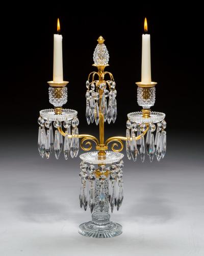 AN ELEGANT PAIR OF ORMOLU GLASS REGENCY CANDELABRA