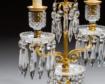 AN ELEGANT PAIR OF ORMOLU GLASS REGENCY CANDELABRA