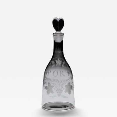 AN ELEGANTLY ENGRAVED PORT DECANTER