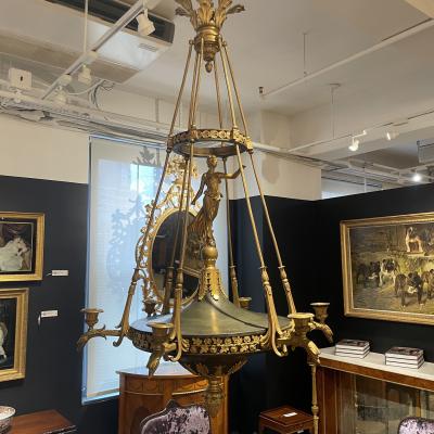 AN EMPIRE STYLE ORMOLU SIX LIGHT CHANDELIER