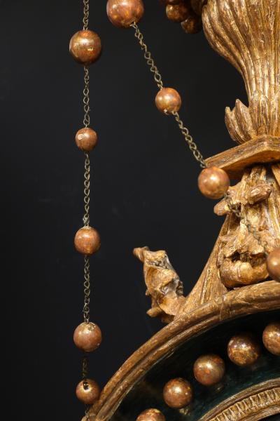 AN ENGLISH REGENCY GILTWOOD CONVEX MIRROR
