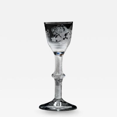AN ENGRAVED MULTI SPIRAL AIR TWIST WINE GLASS