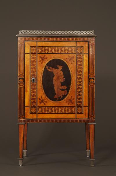 AN EXQUISITE PAIR OF NEOCLASSICAL MARQUETRY AND STEEL MOUNTED PETIT COMMODES
