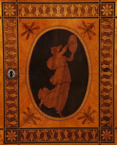 AN EXQUISITE PAIR OF NEOCLASSICAL MARQUETRY AND STEEL MOUNTED PETIT COMMODES