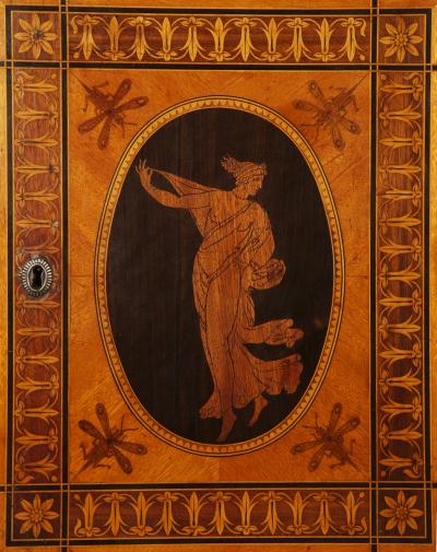 AN EXQUISITE PAIR OF NEOCLASSICAL MARQUETRY AND STEEL MOUNTED PETIT COMMODES