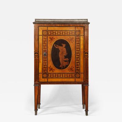 AN EXQUISITE PAIR OF NEOCLASSICAL MARQUETRY AND STEEL MOUNTED PETIT COMMODES