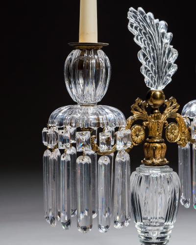 AN EXQUISITE PAIR OF REGENCY CUT GLASS GILT BRONZE CANDELABRA