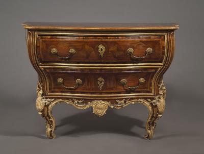 AN EXTRAORDINARY WALNUT AND EXOTIC WOODS INLAID PARCEL GILT COMMODE