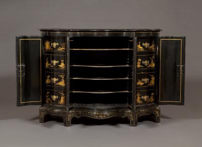 AN IMPOSING SERPENTINE FRONTED CHINOISERIE BLACK LACQUER SIDE CABINET