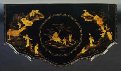 AN IMPOSING SERPENTINE FRONTED CHINOISERIE BLACK LACQUER SIDE CABINET