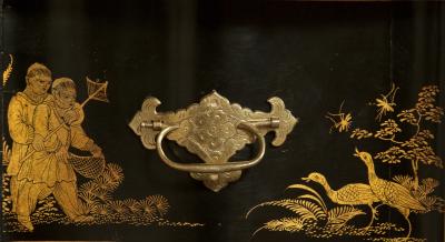 AN IMPOSING SERPENTINE FRONTED CHINOISERIE BLACK LACQUER SIDE CABINET