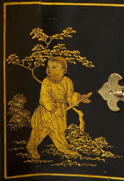 AN IMPOSING SERPENTINE FRONTED CHINOISERIE BLACK LACQUER SIDE CABINET