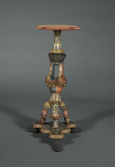 AN INTERESTING PAIR OF CARVED AND POLYCHROME PAINTED STANDS