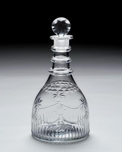 AN IRISH CUT GLASS DECANTER