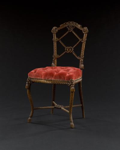 AN UNUSUAL CARVED WALNUT ROPEWORK CHAIR
